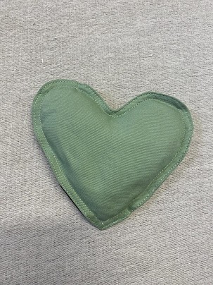 Cherry pit pillow with heart shape - green
